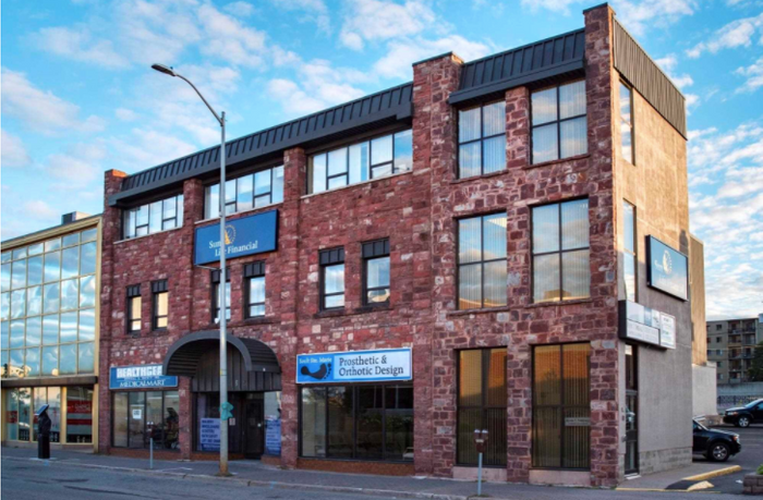 Fully tenanted office building located on Queen Street For Sale