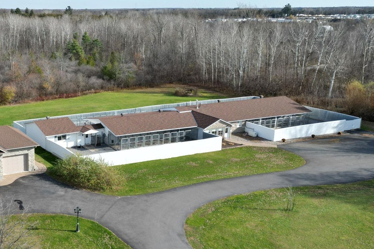 Acreage with Kennel Business/ Facilities/ with this stunning home